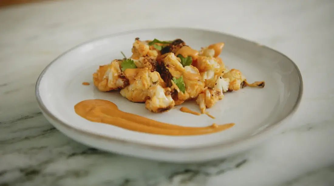 Crispy Cauliflower Bites With Homemade Buffalo Sauce