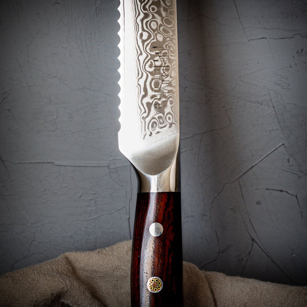 
                  
                    9" Serrated Damascus Bread Knife - Country Life Natural Foods
                  
                