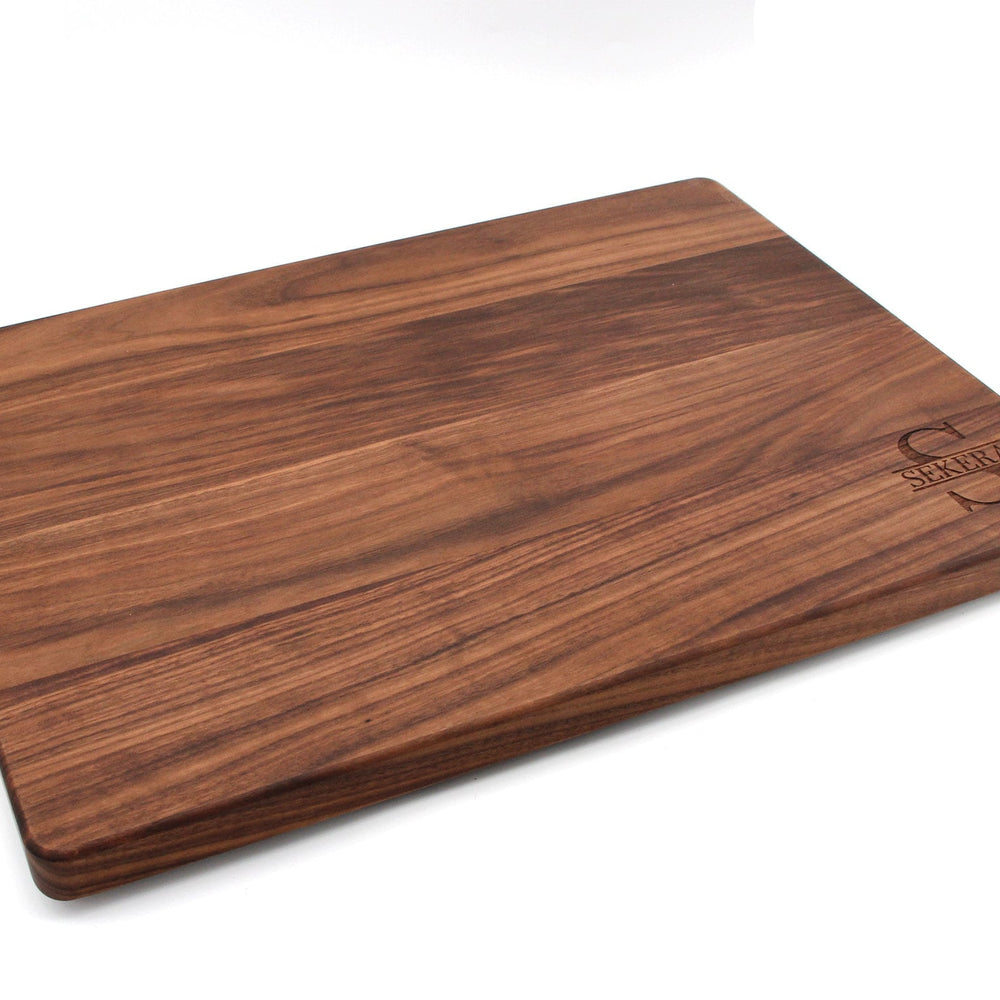 
                  
                    1.25” Thick Extra Large Wood Cutting Board with Feet, Pocket Handles and Juice Groove, 24x18”x1.25 Inches Thick, Gift For Dad, 100% USA Made
                  
                