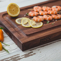 
                  
                    John Boos BBQ Collection Reversible Wood Cutting Board w/Juice Groove, Walnut - Country Life Natural Foods
                  
                
